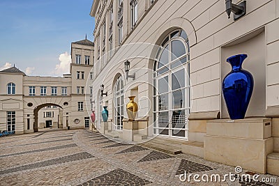 Multicolored mirrored vases decoration in front of the houses square to the Judicial City of Luxembourg Editorial Stock Photo