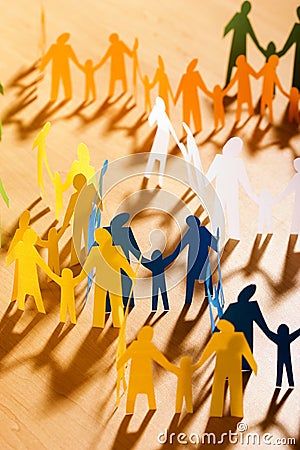 Multicolored papery people Stock Photo