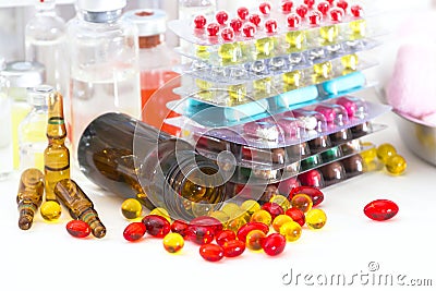 Multicolored pills and capsules Stock Photo