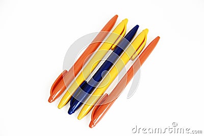 Multicolored plastic stationery pens on a white background Stock Photo