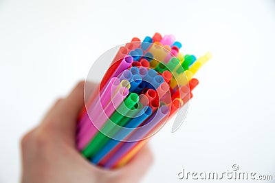 Colored wooden pencils for drawing in a glass stand on a white background. Children`s multi-colored pencils for drawing Stock Photo