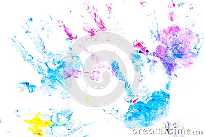 Multicolored prints of children`s hands and feet on white background. Abstract painted background. Children`s art and painting Stock Photo