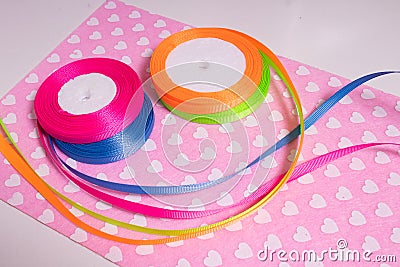 Multicolored ribbons for handmade products. Passion for the soul Stock Photo