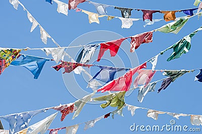 Multicolored shirts hanging Stock Photo