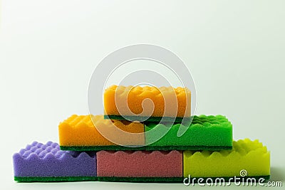 multicolored sponge scourers stacked on grey Stock Photo