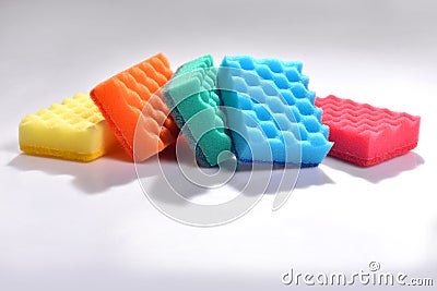 Multicolored sponges for washing dishes on white background Stock Photo