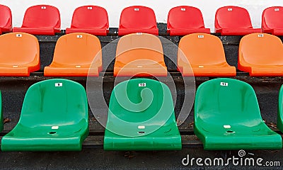 Multicolored stadium seats with numbering Stock Photo