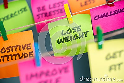 Multicolored sticky notes clipped to the ropes Stock Photo