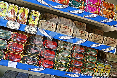 Multicolored tins of canned fish in Lisbon, Portugal Editorial Stock Photo