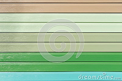 Multicolored vinyl siding with simulated wood texture. Plastic wall covering for exterior decoration of house. Abstract background Stock Photo