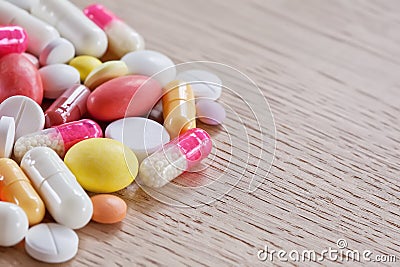 Multicoloured pills and capsules Stock Photo