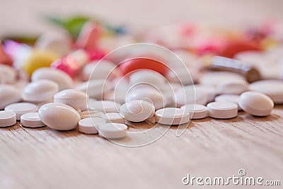 Multicoloured pills and capsules Stock Photo