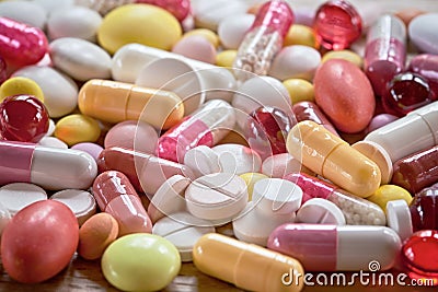 Multicoloured pills and capsules Stock Photo