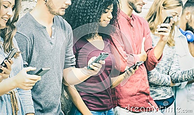 Multicultural friends group using mobile smart phone Stock Photo