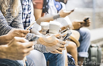 Multicultural friends group using smartphone with coffee cup Stock Photo