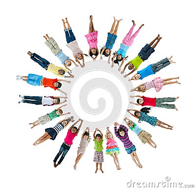 Multiethnic Children Lying Down Forming Circle Stock Photo