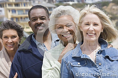 Multiethnic Friends Standing In A Row Stock Photo