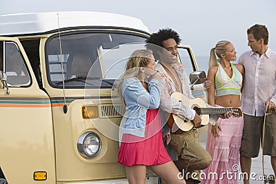 Multiethnic Group With Campervan Stock Photo
