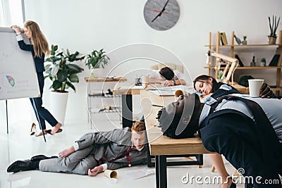 multiethnic group of exhausted businesspeople sleeping Stock Photo