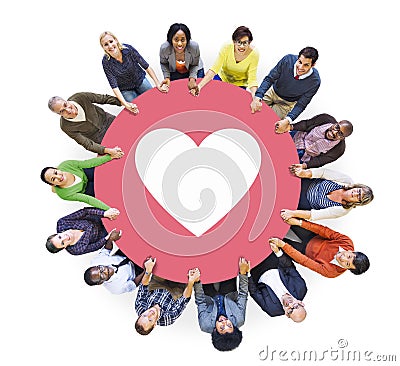 Multiethnic People Holding Hands with Heart Symbol Stock Photo