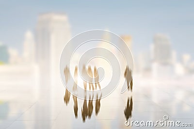 Multiexposure of business people walking to the big city Stock Photo