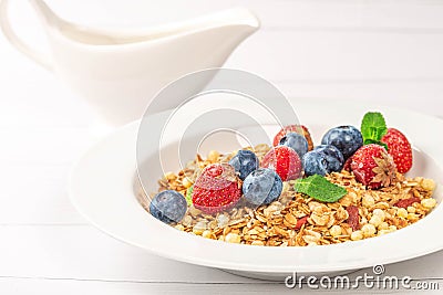 Multigrain breakfast with seeds, dried and fresh berries Stock Photo