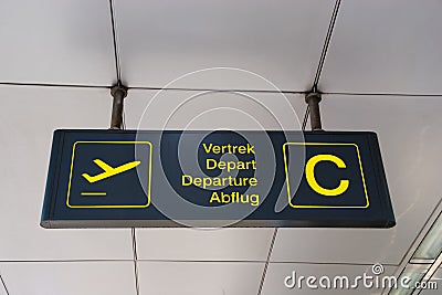 Multilingual Airport Sign Stock Photo