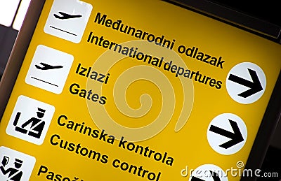 Multilingual Airport signs Stock Photo