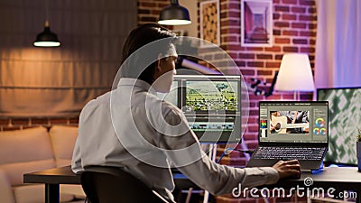 Multimedia artist editing video montage with sound and visual effects Stock Photo