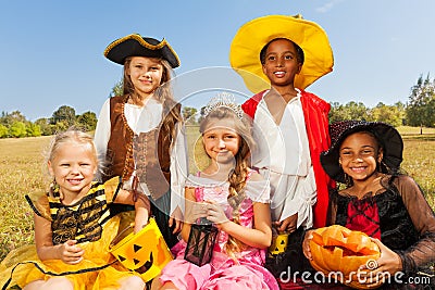 Multinational kids in Halloween costumes Stock Photo