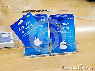 Multiple Apple App Store and iTunes gift cards, lots of blue gift cards, Polish currency. Buying games, music, movies, books Editorial Stock Photo