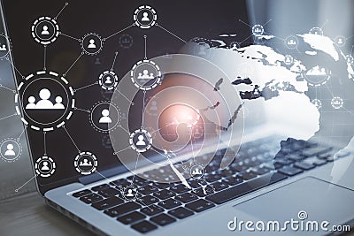 Multiple application icons with a laptop in the background Social network and online interaction concept, double exposure Editorial Stock Photo