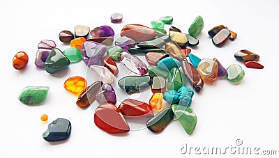 Multiple bright coloured semi precious gemstones and gems for decoration Stock Photo