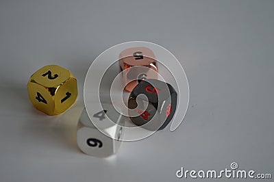 Multiple d6 six sided dice die copper silver gold black Stock Photo