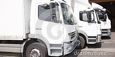 Multiple delivery small van white transportation truck park Stock Photo