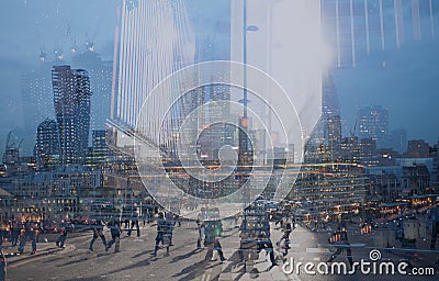 Multiple exposure of city commuters and skyscrapers in London Stock Photo