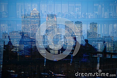 Multiple exposure of city commuters and skyscrapers in London Stock Photo