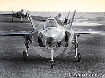 Multiple F35 military jet strike aircraft preparing for takeoff on a strike mission. Stock Photo