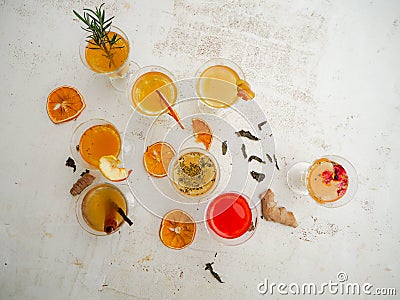 Multiple glasses with a variety of kombucha flavors on a white background Stock Photo