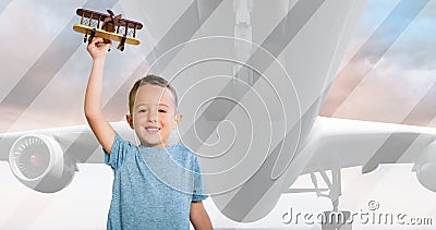 Multiple image of airplane flying in sky and portrait of caucasian smiling boy flying toy airplane Stock Photo