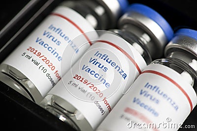 Multiple Influenza Virus Vaccine Vials Stock Photo