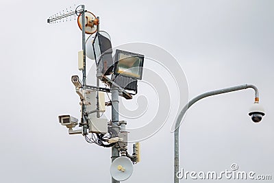 Multiple outdoor CCTV security cameras attached the light pole Stock Photo