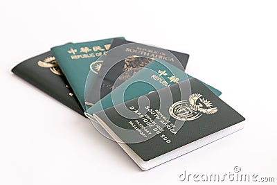 Multiple passports on white background Stock Photo