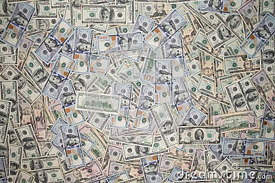 Multiple scattered American 100 dollar banknotes Stock Photo