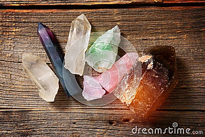 Multiple semi precious gemstones on board Stock Photo