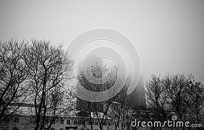 Multiple skyscrapers in fog scary architecture Stock Photo