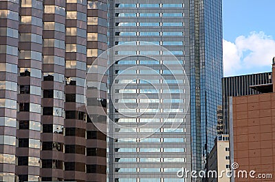 Multiple skyscrapers reflecting in the sun Stock Photo