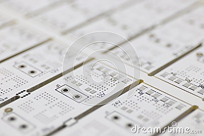 Multiplied printed circuit boards PCB. Abstract background. PCB assembly. Close-up view Stock Photo