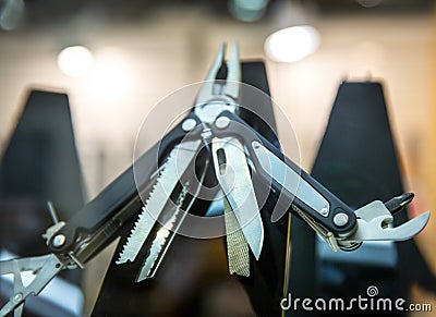 Multipurpose knife, black swiss penknife closeup Stock Photo