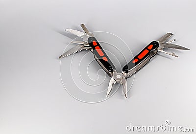 Multipurpose Tool - Multipurpose pliers, knife, screwdriver, hook, saw Stock Photo